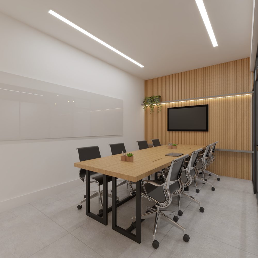 Sala de reunião com mesa comprida de madeira para dez lugares, cadeiras pretas, televisão na parede de ripas de madeira e iluminação linear no teto